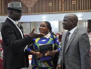 The author and Special Adviser on Media to the Governor Fashola, Mr Hakeem Bello (left), Event Manager, Mainevents, Ms. Bimbo Johnson (middle) and the Chief Executive Officer, S. B. Royal Industrial Auctioneers Limited, Auctioneer Olusesan Ayinde Bakare (left)  during the launch of three New Titles – The Great Leap, In Bold Print and The Lagos Blow Down, edited by Hakeem Bello and Dapo Adeniyi in honour of the former Governor of Lagos, Mr. Babatunde Fashola, at the Shell Hall of the Muson Centre, Victoria Island, Lagos, on Tuesday, August 18, 2015. 