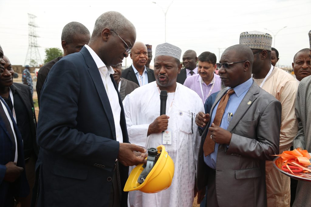 Hon. Minister of Power, Works & Housing, Mr Babatunde Fashola,SAN(left), Managing Director,Yola Electricity Distribution Company(YEDC),Engr. Baba Umara Mustapha (left) and Managing Director/CEO, Faro Table Water, Mr Ahmed Jarma(middle) during the commissioning of  33KV Industrial Feeder to Kofare Industrial Area -Jimeta shortly before the 27th Meeting with Operators in the Power Sector hosted by the Yola Electricity Distribution Company(YEDC) at the TCN Transmission Station along Numan Road, Jimeta, Adamawa State on Monday, 14th May 2018.  