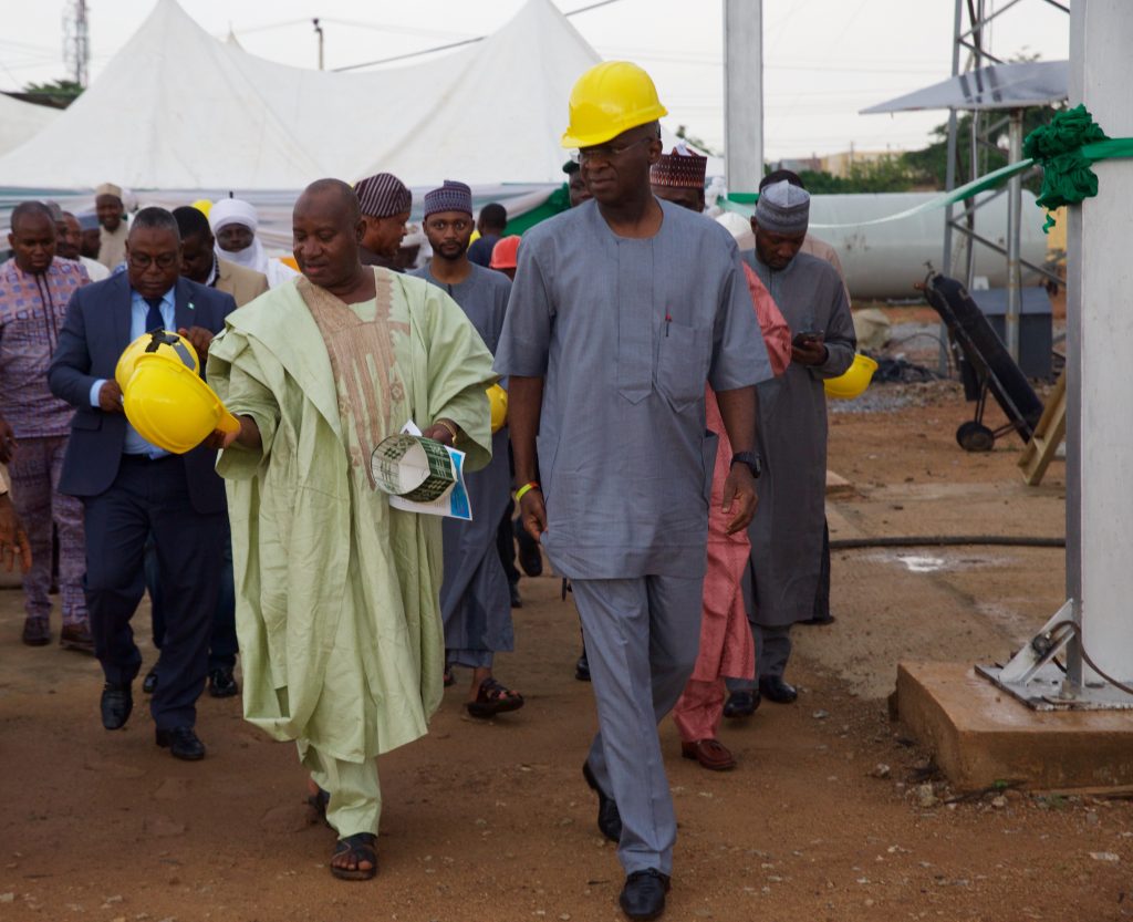 Hon Minister of Power, Works & Housing, Mr Babatunde Fashola,SAN(right) and representative of the Governor of Kaduna State & Permanent Secretary of the Ministry of Rural and Community Development, Mallam Mahmud Zailani (left) during the commissioning of the 60MVA ,132/33KV Transformer at the Zaria Transmission Substation, Zaria, Kaduna State on Sunday 10th June 2018.   