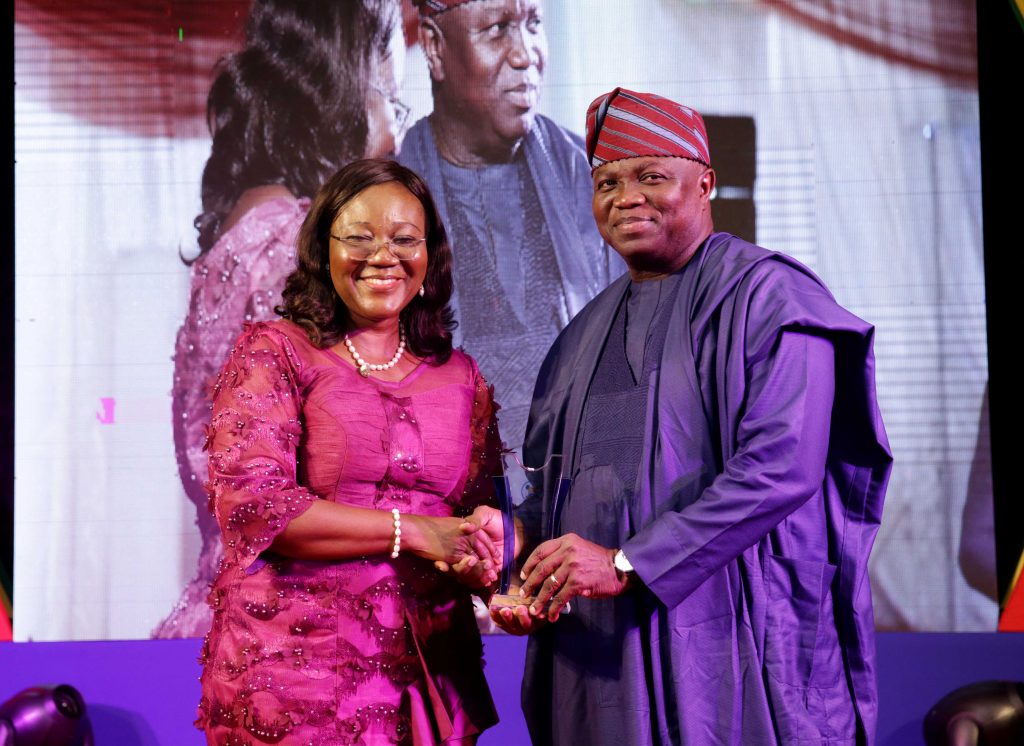 Lagos State Governor, Mr. Akinwunmi Ambode (right); being presented with a plaque as the most outstanding Public Servant by the Head of Service, Mrs. Folasade Adesoye during a special dinner in honour of outstanding Public Servants in the State at Lagos House, Alausa, Ikeja