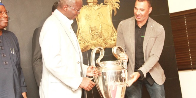 Lagos Governor Babatunde Fashola receives Uefa Cup and Guilt in his Office