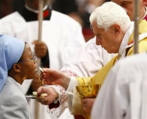 To avoid the spread of Ebola virus,Catholic mission adopt new method of giving Holy Communion.