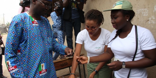 PICTURES: GOV. FASHOLA COLLECTS HIS PVC AT SURULERE POLLING UNIT