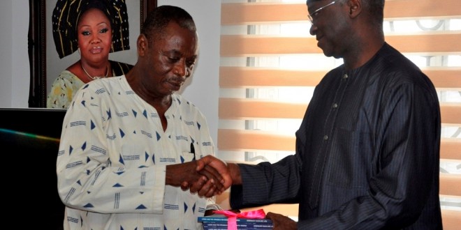 Ex Gov Fashola receives book on Lagos