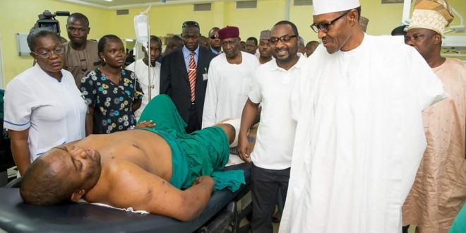 Buhari takes succor to young girl and survivors of Abuja bomb blast