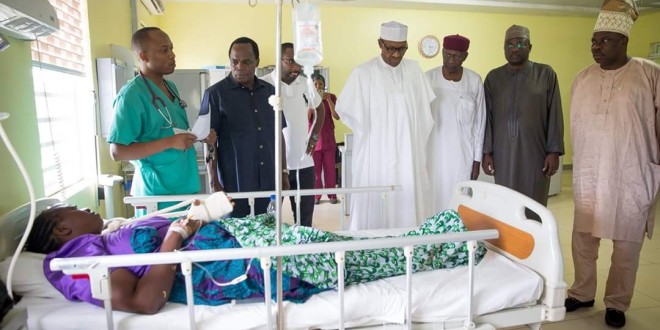 Pics As Buhari visits Victims of fridayBomb blast in hosipital