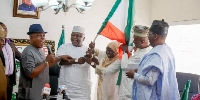 Ogun PDP Chairman Congratulates Oladipupo Adebutu As He Receives Party’s Guber Flag From National Chairman