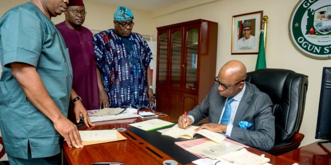 ABIODUN  SIGN SECURITY TRUST FUND, OGROMA BILLS INTO LAW