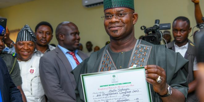 PHOTOS – INEC PRESENTS CERTIFICATE OF RETURN TO YAHAYA BELLO