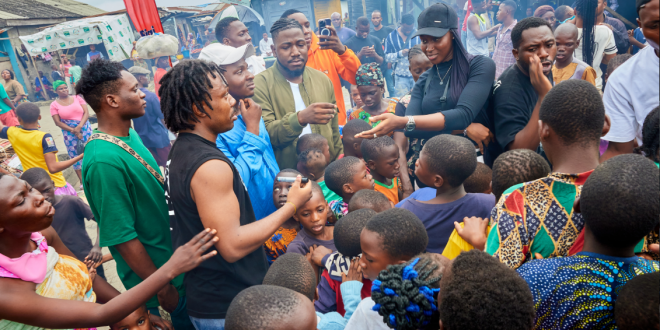 Share A Smile Slum Food Outreach Teams Up with Ex-Nigerian Idol Contestant, Chisom to Delight 1000 Children in Makoko with a Special Feast Supported by Bigi.